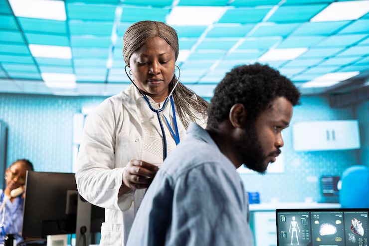 imgi 50 african american doctor does respiratory examination checkup with stethoscope 482257 122822